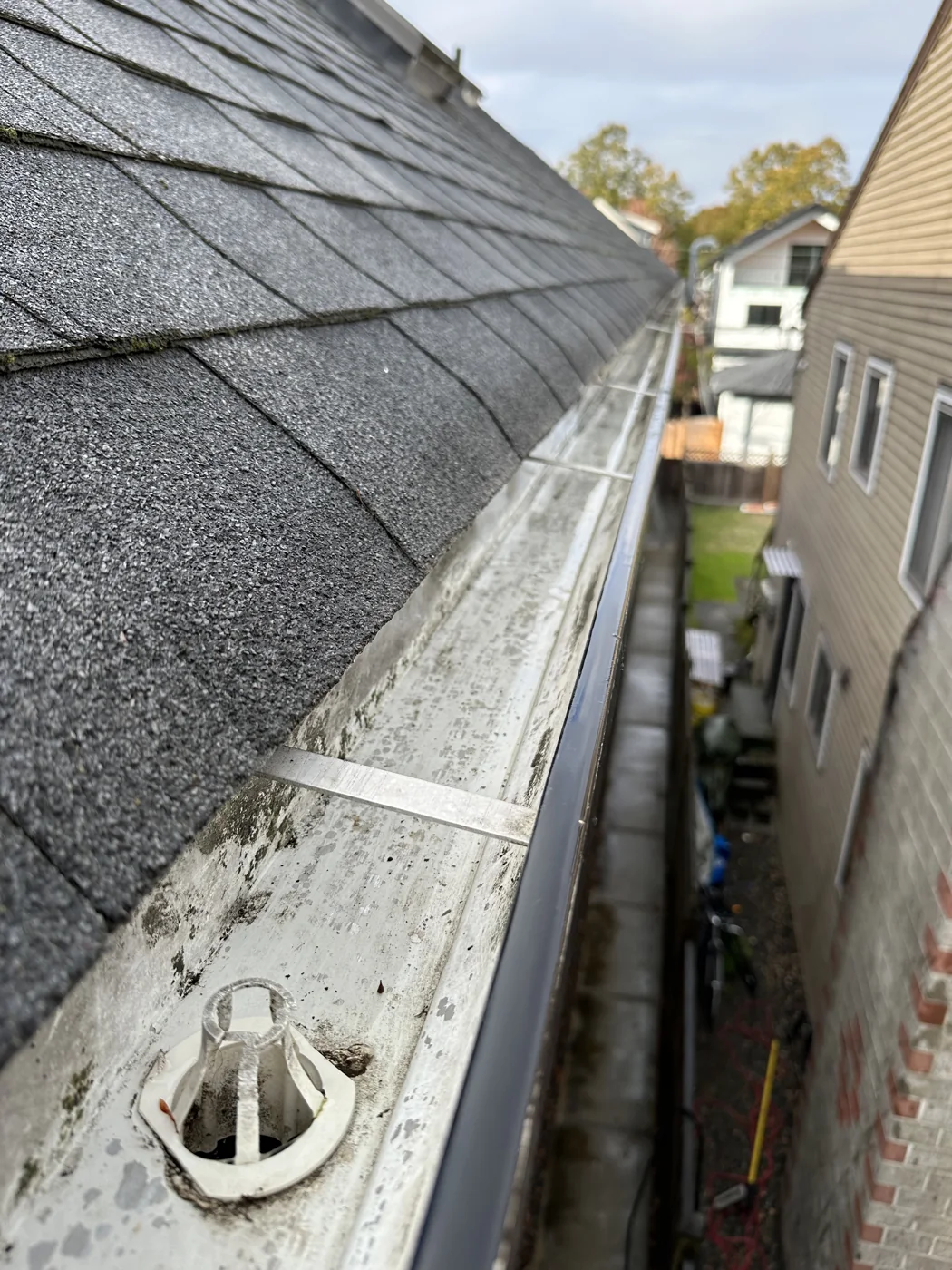 Upper gutter channel after leaf and debris removal